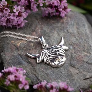 Highland Cow pendant in sterling silver with a 16-18 inch adjustable length chain.