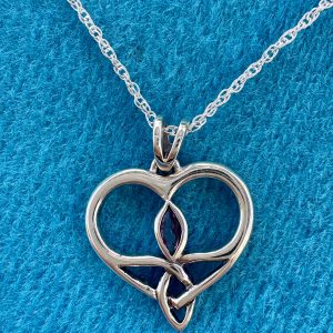 Celtic Heart Pendant with amethyst center twist. Adjustable 16-18 inch chain. Silver. Scottish Treasures